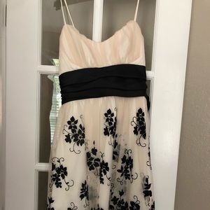 Short, formal black and white dress